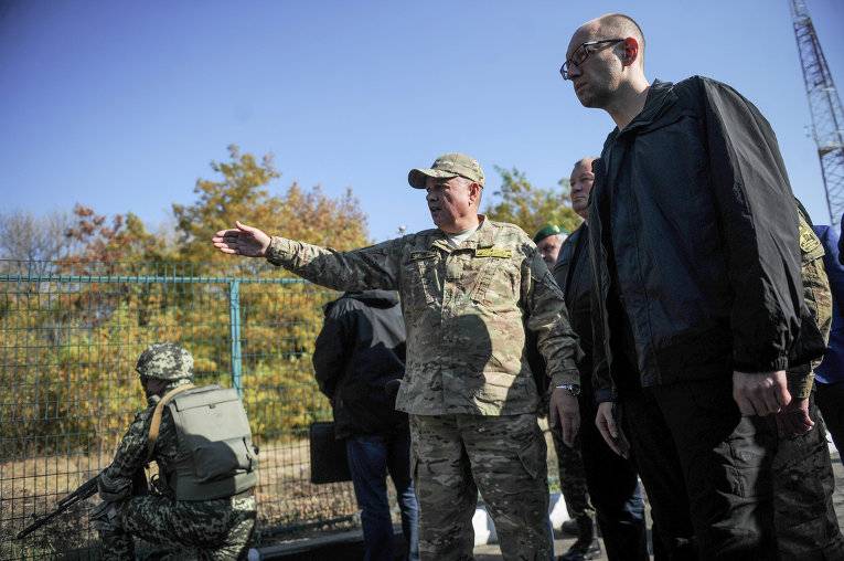 Yatsenyuk ready to tell Trump how to build a fence economy