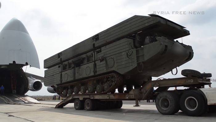 The Russian military built a bridge to transport heavy equipment across the Euphrates at Deir ez-Zor