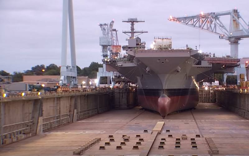 In the United States began launching built aircraft carrier John F. Kennedy